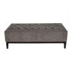 Elegant ottoman with deep buttoning detail on the seat