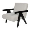 Minimal boucle upholstered armchair with black armrests