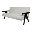 Sleek boucle upholstered sofa with black arm rests