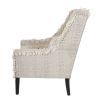 Textured upholstered armchair with tassels and black wooden legs