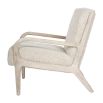 wooly upholstered armchair with washed wood frame