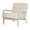 wooly upholstered armchair with washed wood frame