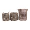 Black and white rattan baskets in a set of three