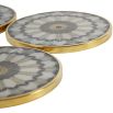 Grey patterned coasters with brass edges