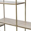 round shelving unit with brass frame and travertine marble shelves
