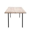 A stylish natural oak table with black iron legs