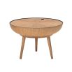 A gorgeous Nordic-inspired round oak coffee table with a removable top