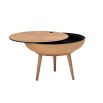 A gorgeous Nordic-inspired round oak coffee table with a removable top