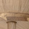 A gorgeous Nordic-inspired round oak coffee table with a removable top