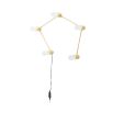 A luxurious golden table lamp with white glass lampshades