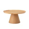 A classic natural oak round coffee table
