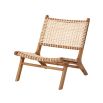 A luxurious teak and rattan lounge chair 