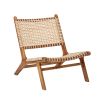 A luxurious teak and rattan lounge chair 