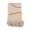 Neutral tone cotton throw with a colourful abstract design
