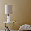 a luxurious alabaster table lamp with a cotton lampshade