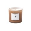 A beautiful scented candle from Bloomingville with a light brown coloured glass container and sea salt scent
