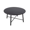 A sophisticated, rounded dining table made from black stained acacia wood