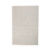 A woven rug in a white cotton finish with decorative geometric motifs