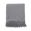 A simple grey throw made from recycled cotton