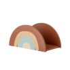 A dainty shelf with a rainbow-inspired design and contemporary colour scheme