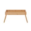 A classically designed tray table with foldable legs in a natural finish