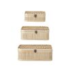 A set of 3 stylish storage boxes with a rattan finished woven design