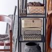 A set of 3 stylish storage boxes with a rattan finished woven design