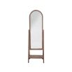 A chic standing mirror in a brown frame and a small lower shelf