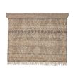 Natural geometric rug crafted out of jute and wool