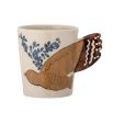 Mug with bird detail design