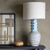 Illuminate your space with the stylish Gadiela Side Lamp, featuring a modern design and warm glow. Perfect for any room or decor!