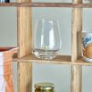 Clear drinking glass with flower at base