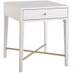 White wooden bedside table with brass accent