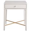White wooden bedside table with brass accent
