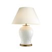 Leaf motif table lamp in white with brass accents