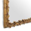 Floret style frame mirror in brass finish