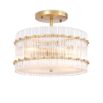 glamorous ceiling lamp in antique brass and encircled by ribbed clear glass
