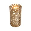 Chic candle holder with hole pattern and brushed brass finish