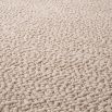 A gorgeous, bobbled texture, wool rug in a beige finish 