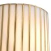 Brass ribbed wall light with gentle radiant glow