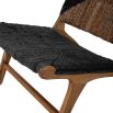 Enchanting laid-back lounge chair with black graphic pattern and natural textures.