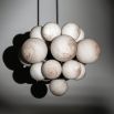Elegant and eye-catching chandelier with marble orb shades with gunmetal frame