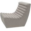 Statement curved lounge chair with boucle taupe channelling