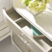 Glamorous cream finish bedside table with three drawers