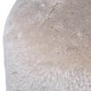 Snuggly sheepskin pouffe in cream colour
