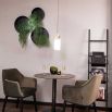 Contemporary round wall-mounted planter in black 