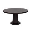 Smooth rounded top dining table elevated by a softly tapered cylinder base