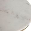 Round brass coffee table with white marble top