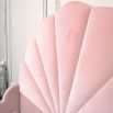 Gorgeous, statement kingsize bed with rounded, fluted headboard and blossom coloured upholstery