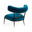 Blue velvet laid back lounge chair with brass accents